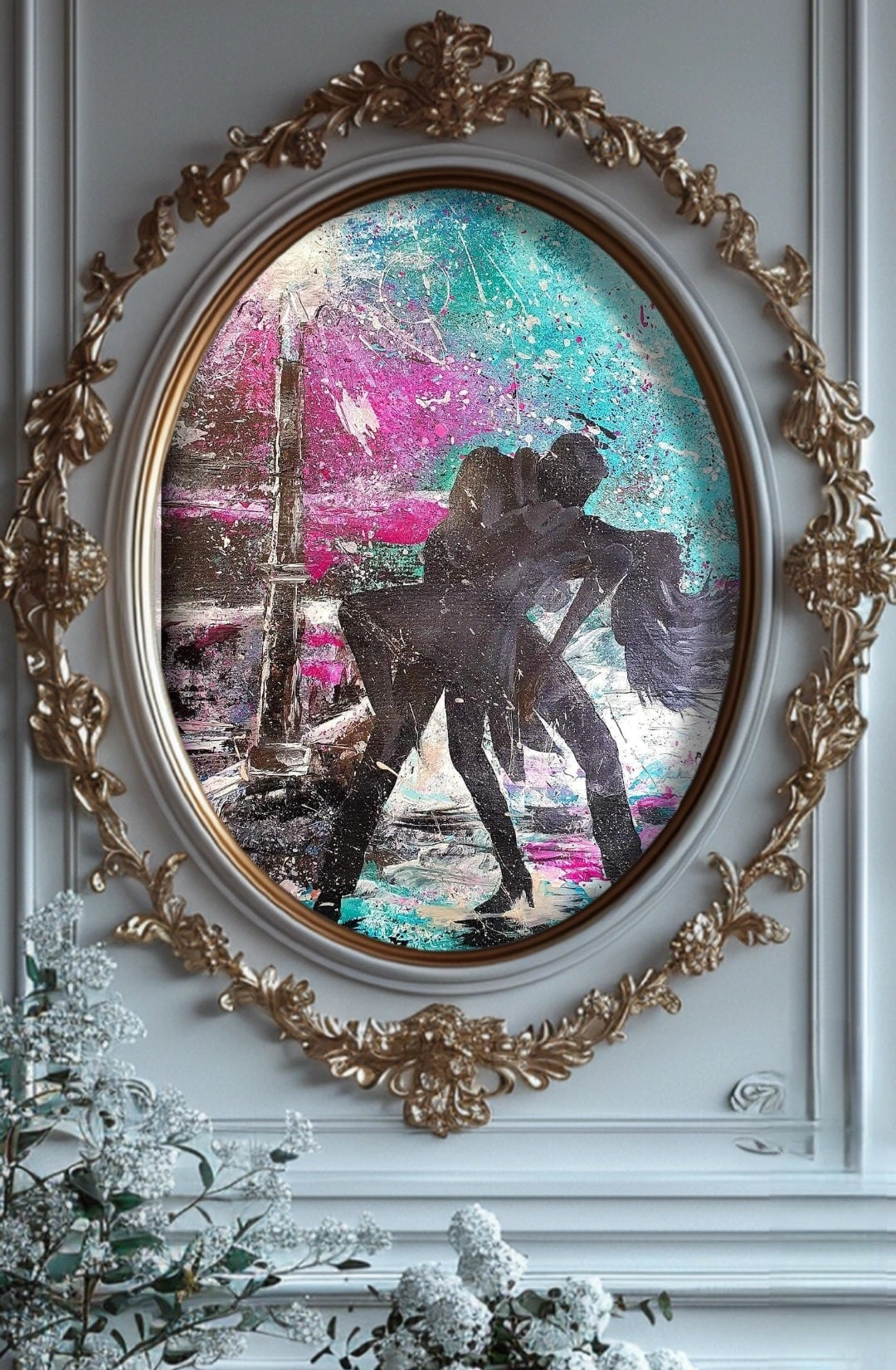 Decorative oval mirror with gold frame on a wall, featuring a silhouette of a couple embracing.
Colorful abstract painting of a couple dancing over a couch with colorful cushions. Colorful movement. Abstract painting. Wall art. Art decor for living room. lounge room. Movement with style. Love of movement and music. Love of dance. Couples dancing. Paint splatter with emotion. Inspiration for design. interior design.
Vintage wall decorations. Gold leaf edges. Vintage furnature