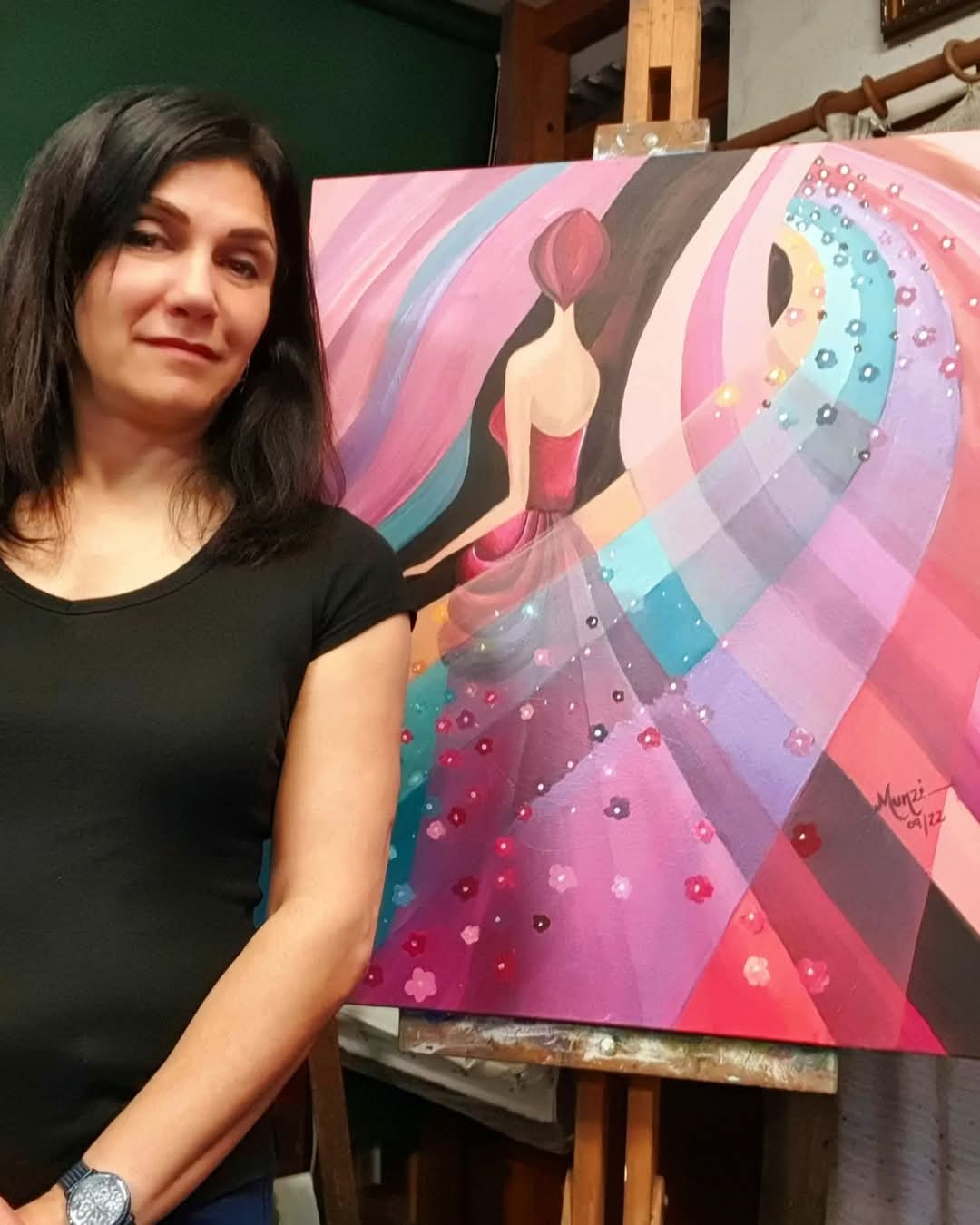 Munzi artists next to Original vibrant abstract artwork featuring a female figure in a flowing red and pink dress with embedded flowers, set against a dynamic multicolored background.
Artwork for home, office, studio. Red, orange, pink, blue waves. Interior design interior decorations. Wall art. Art collectors sales