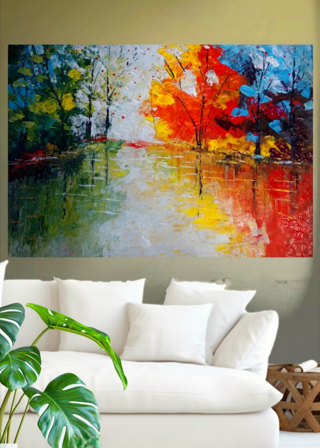 An abstract painting of red, blue trees lining a body of water with the reflections shining through. Bold pallet knife and brush strokes. Home decor. Wall art and art collectors.