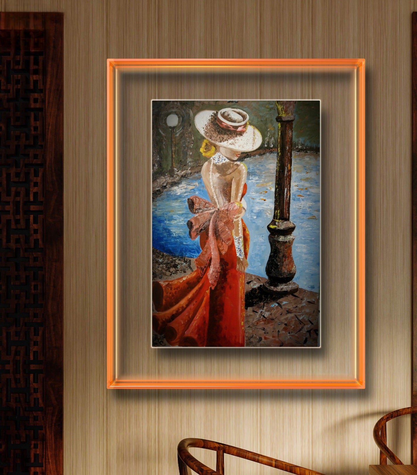 A painting featuring a woman in a red dress with a white hat, standing near a lamp post with a body of water and a dark sky in the background. Wall art and home or office decor. Hanging on a beige textured wall with wooden seats