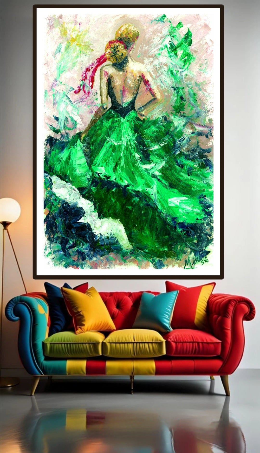 Colorful abstract painting of a woman in a green dress on a white wall above a multicolored sofa.